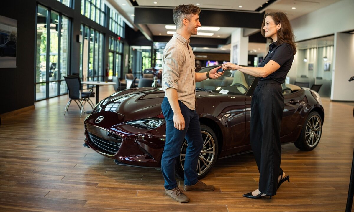 Mazda key handoff close-up