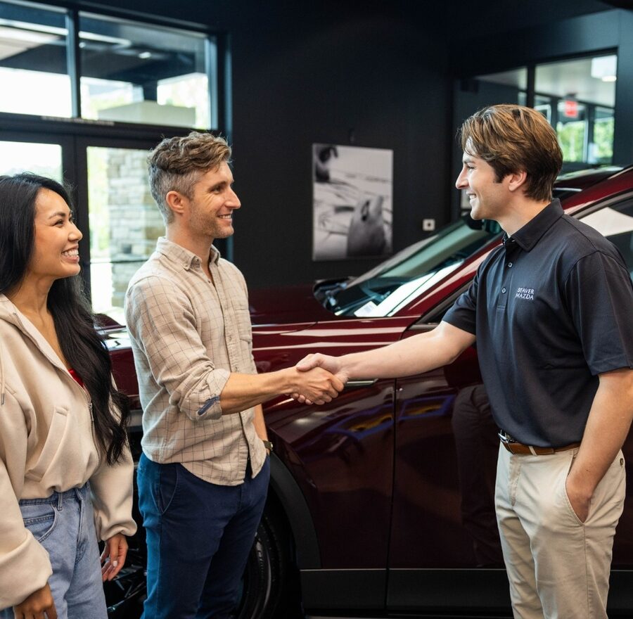Customer closing a deal at Beaver Mazda